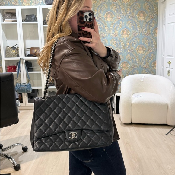 CHANEL Handbags - Chanel Black Caviar Maxi Classic Single Flap with Silver Hardware